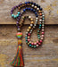  Hand-strung chakra healing necklace with triangle charm and 7 semi-precious stones for spiritual balance