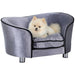 Orthopedic pet sofa for small dogs and cats with washable cover and storage pocket.