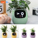 Tuya Ivy Smart Planter - AI-powered interactive plant pot with self-watering system and expressive reactions.