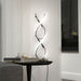 Chrome swirl LED table lamp with modern design and 3 dimmable brightness levels – sculptural desk or bedside lighting UK