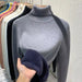 Women’s turtleneck plush fleece sweater, warm winter pullover, cosy fleece lining, stylish cold-weather jumper.