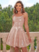 Woman wearing a sparkly sequin mini dress with a fitted silhouette and UK sizing

