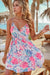 Floral mini dress with spaghetti straps, surplice neckline, and shirred waist, offering a stylish and flattering fit