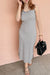 Woman wearing a cutout crisscross back bodycon dress with a flattering figure-hugging fit

