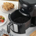 Compact digital air fryer with LED controls and 12 preset cooking functions

