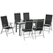 Seven-piece outdoor dining set with rectangular tempered glass table and six folding aluminium frame chairs