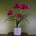 Realistic faux amaryllis flower arrangement with 5 blooms in grey pot

