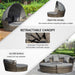 4-piece outdoor rattan daybed set with canopy and cushions on a garden patio

